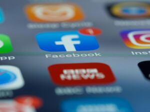 Cybersecurity tips for remote workers showing secure laptop, VPN connection, and password protection setup at home office.