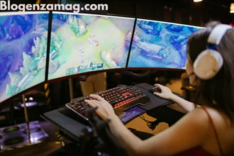 A gamer using a triple-monitor setup with Tommy Jacobs Gaming EyeXcon for immersive esports experience.