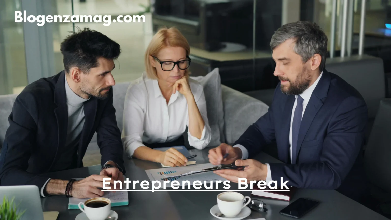 Business professionals discussing strategy during an Entrepreneurs Break meeting about work-life balance and productivity — BlogenzaMag.com